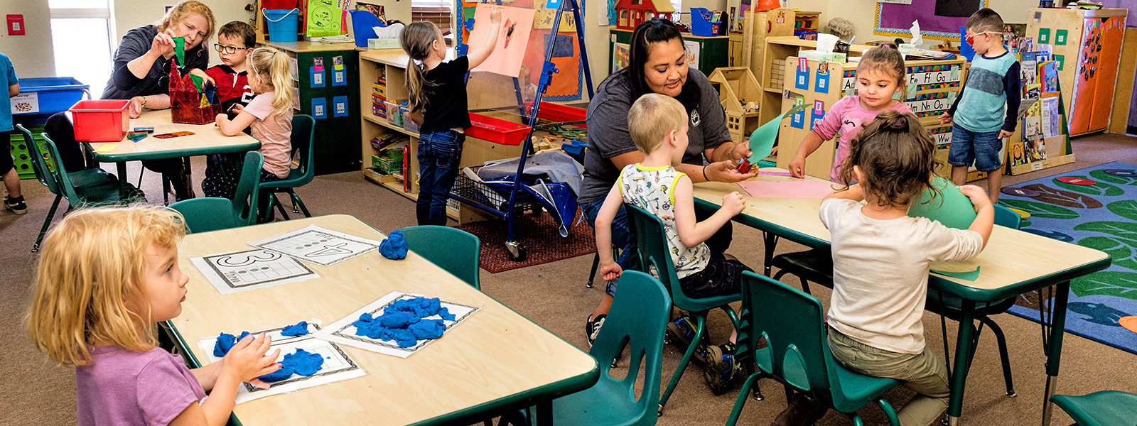 children in daycare doing various activities