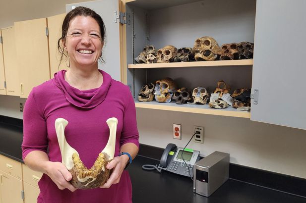 Eleanore Hempsey with bones and skulls