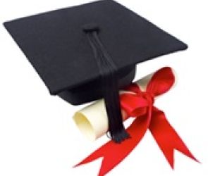 Black graduation cap with diploma rapped in red ribbon