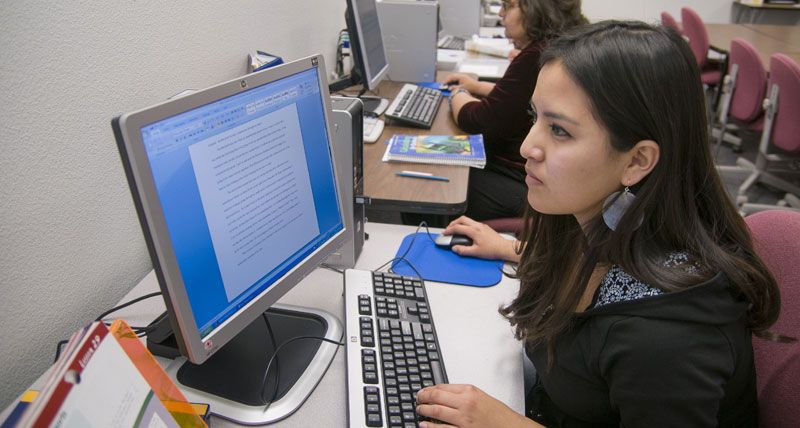 Student logging into computer