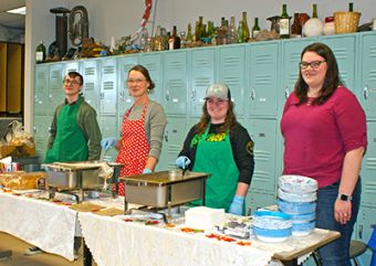 Empty Bowls 2019 Magda Gluszek (red apron) and volunteers served up hot soup and bread to hungry participants.