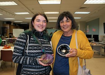 Empty Bowls 2019 Left to right, Adrienne and Lynn Tims show the bowls they made and are getting ready to eat from.