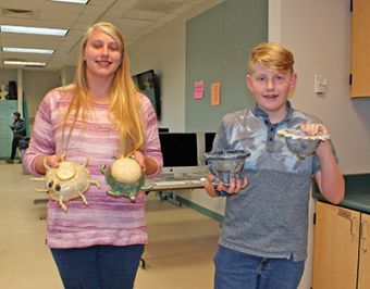 Empty Bowls 2019 Kaitlyn and Blake Johnson are eager to take their family’s bowls home to them.