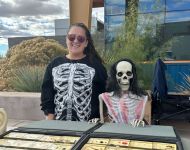 Skeletons at a booth