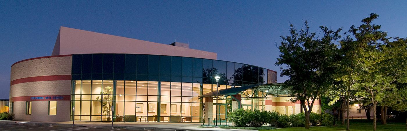 photo of the perfomring arts center at dusk